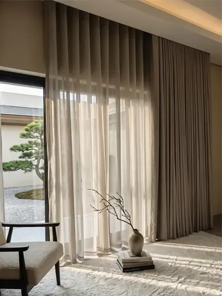 Elegant living room with floor-length curtains and styled interior